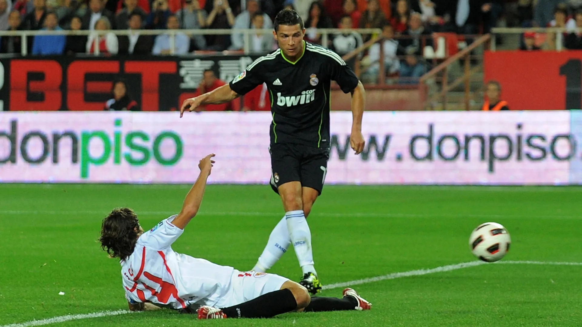 Cristiano Ronaldo of Real Madrid scores Real's sixth goal against Sevilla. (Denis Doyle/Getty Images)