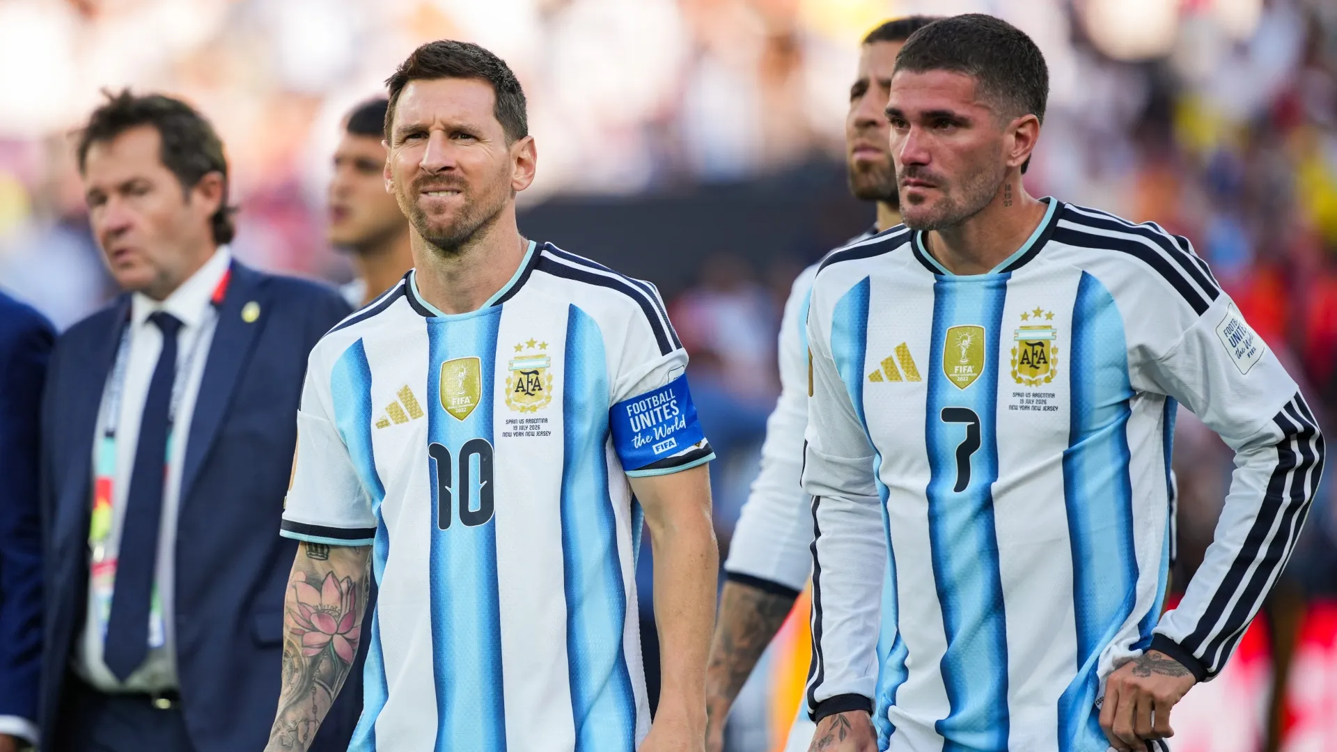 Lionel Messi and Rodrigo De Paul of Argentina look dejected after the FIFA World Cup 2026 Final.