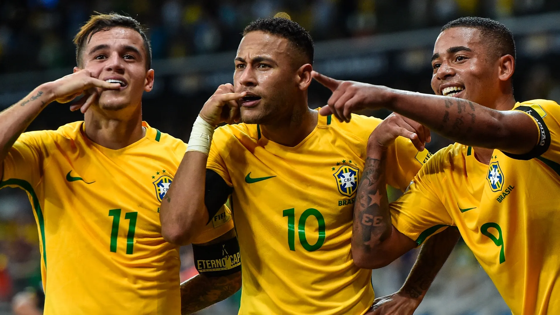 Philippe Coutinho #11, Neymar #10 and Gabriel Jesus #9 of Brazil celebrating.