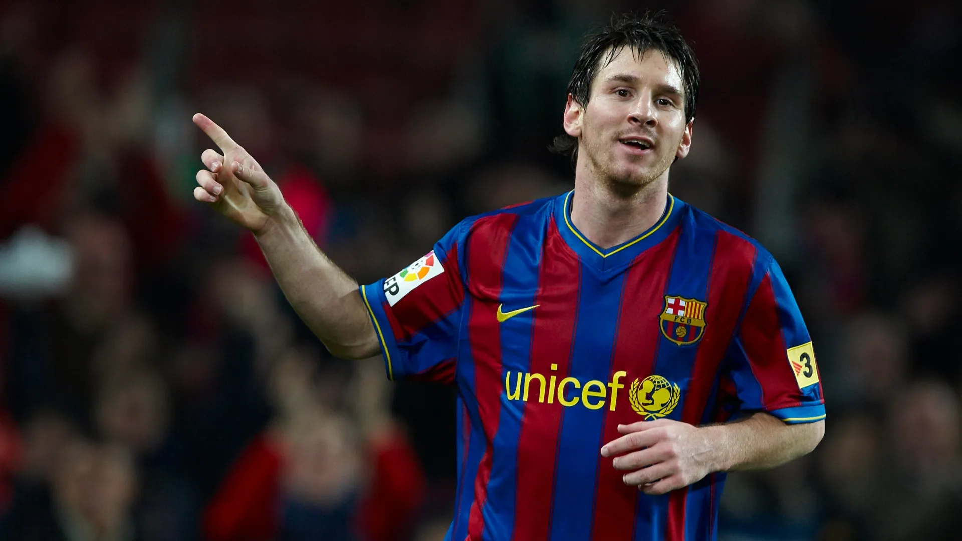 Lionel Messi of FC Barcelona celebrates after scoring against Sevilla on January 16, 2010.